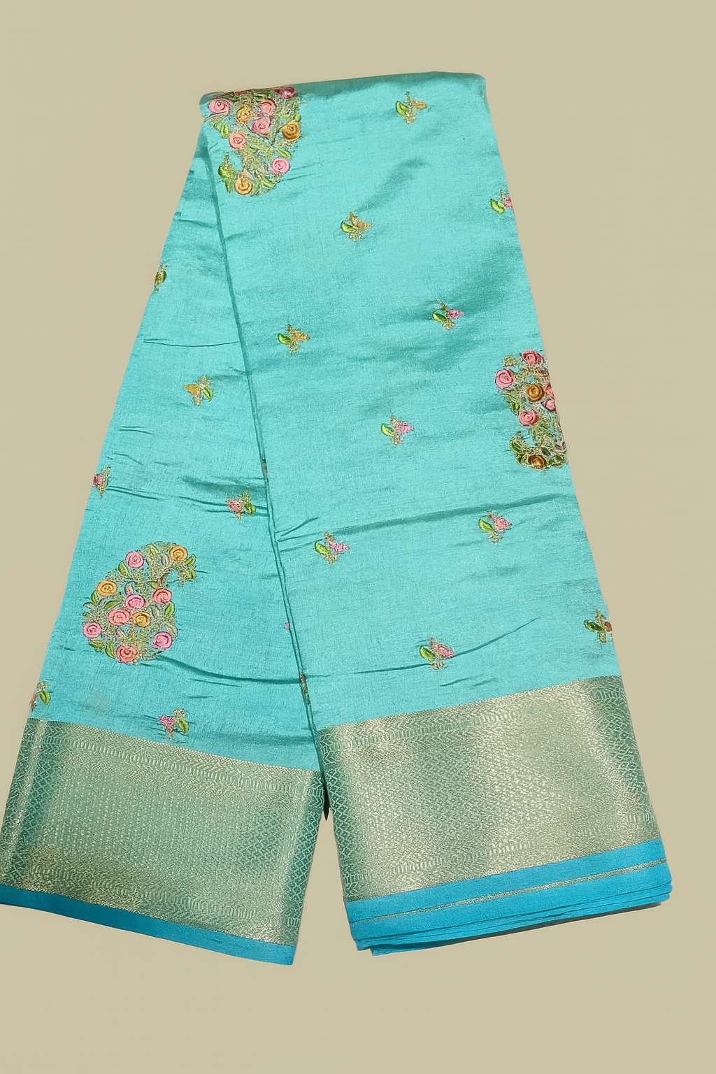 Turquoise Art Silk Saree with Floral Embroidery and Silver-Zari Border