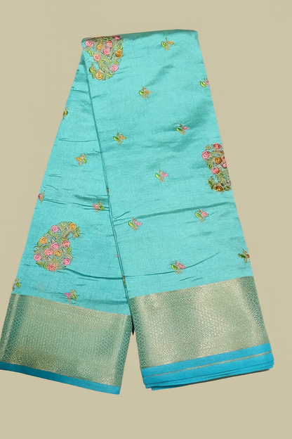 Turquoise Art Silk Saree with Floral Embroidery and Silver-Zari Border