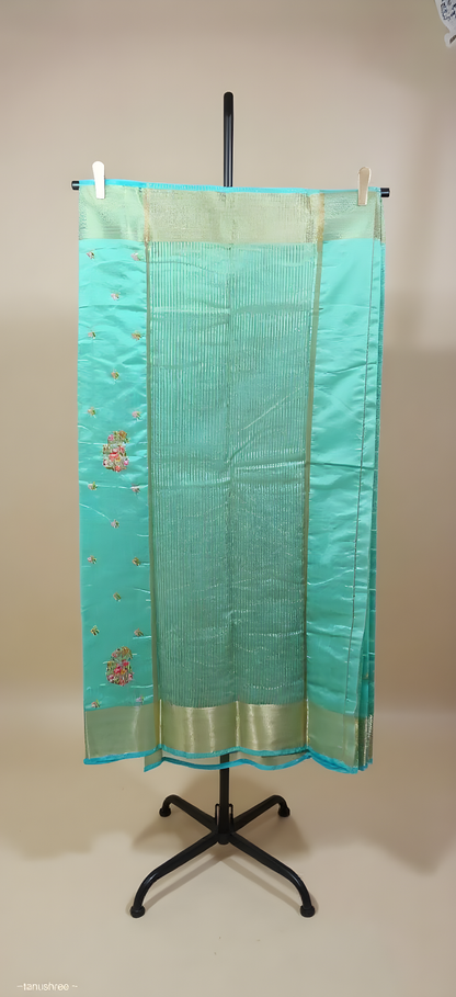 Turquoise Art Silk Saree with Floral Embroidery and Silver-Zari Border